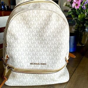 Michael Kors mini backpack. White and beige. Used